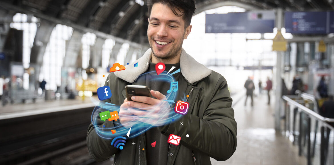 medium-shot-man-holding-smartphone #image_title